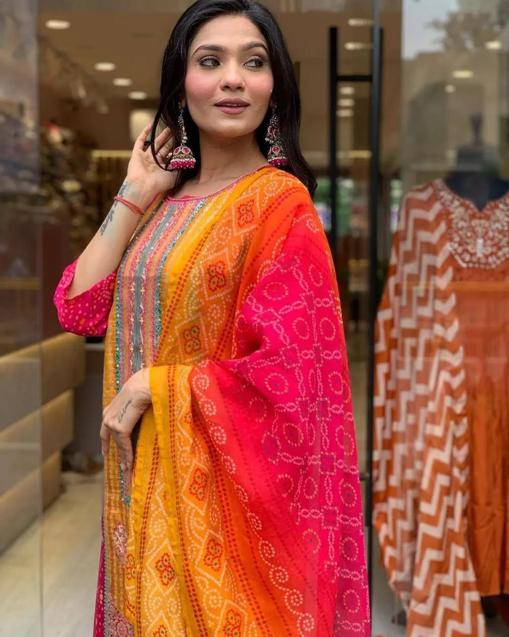 Multicolored Bandhani Print Suit with Stone Work & Dupatta